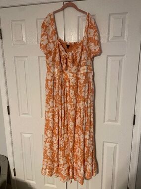 Floor length coral orange dress
